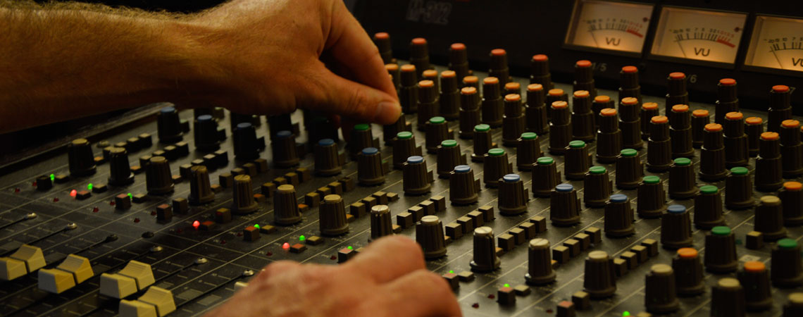 mixing audio on a mixing desk