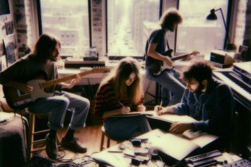 A band song writing in a Manhattan loft